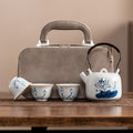 A Set of Hand-Painted Teapots, And Porcelain Travel Tea Set, Lotus Flower Kettle with a Storage Bag, One Kettle And Three Cups, Portable Tea And Coffee Combination for Outdoor Camping, a Business Gift, Perfect for Tea Enthusiasts